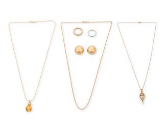 1093 A Group of Gold Jewelry Including one pair of earrings, two rings, two necklaces and one chain 7 pieces  Chains: 18, 21 and 22 in. Earrings: 3/4 in., Rings: 5 1/4 and 6 1/4 29.2 grams gross Estimate: $1,000 - $1,500