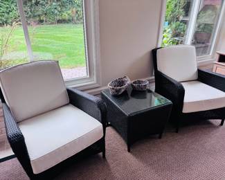 Like new black woven patio/ sunroom chairs and tables