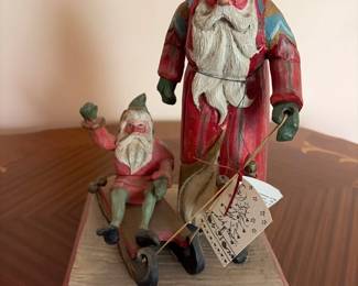 006 HandCarved Wood Santa Pulling Elf on Sled