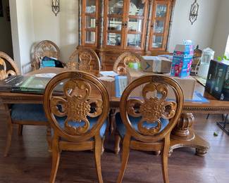 Table is 78, 96 or 114 inches long, 45 inches wide. Seats 10 with 2 captain chairs and 8 side chairs.  China cabinet is 86H x 72L x 20 deep. 