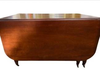 Mahogany Drop Leaf Table With Brass Casters
