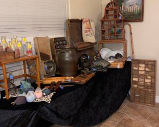 Primitives .. butter churns, bird cage, dough kneader, rolling pin, antique tin ware, enamelware, utensils, kraut board, printers tray .. and more 