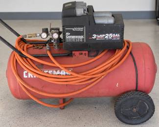 Weathered Craftsman Air Compressor with Orange Hose