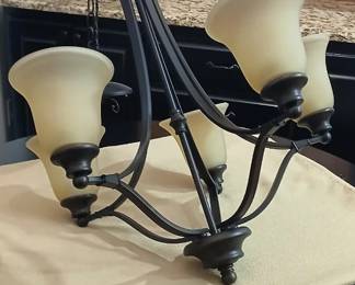 5-light bronze finish chandelier with amber colored shades