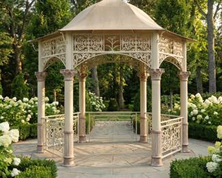 Decorative garden gazebo with a domed roof and ornate columns, outdoor pavilion and formal courtyard focal point.