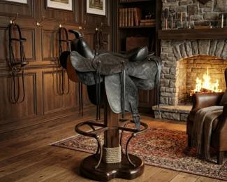 Western saddle bar stool with a pedestal base, equestrian furniture and rustic ranch or lodge decor.