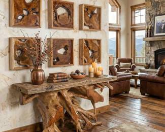 Sculptural live-edge console table with decorative root-wood wall panels, rustic entryway furniture and organic modern decor.