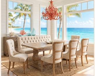 Coastal dining table, tufted dining bench, upholstered dining chairs and statement chandelier for a beach-inspired dining room.