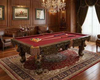 Ornate carved billiard table with red felt, traditional pool table and statement game room furniture.