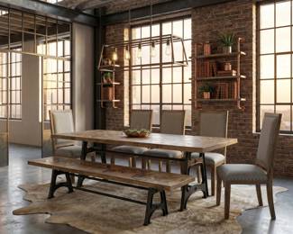 Rustic industrial dining table with a matching bench, upholstered chairs and wood-and-metal dining room furniture.