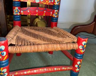 another angle of the child's seat with ladder back frame and woven rush seat