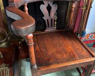 Roundabout / Corner Chair with curved horseshoe armrest