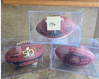 Lot #D118 Three Vintage NFL Commemorative Footballs – Super Bowl XLVIII, Super Bowl 50 & Denver Broncos – Display Cases Lot #D118 Three Vintage NFL Commemorative Footballs – Super Bowl XLVIII, Super Bowl 50 & Denver Broncos – Display Cases