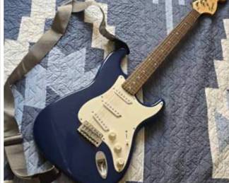 Lot #J54 Squier by Fender Affinity Stratocaster Electric Guitar – Metallic Blue – 6 String – Strap and case included