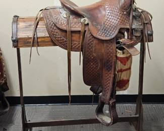 Checkered Western Saddle with Rustic Stand