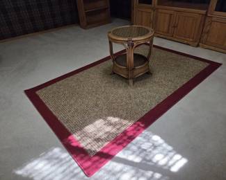 Wicker  Rattan GlassTop End Table with BurgundyBordered Area Rug