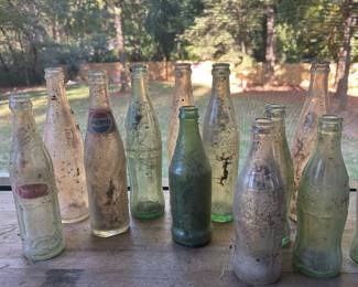 #24 Old soda bottles (12) Pepsi, PepsiCola, Cheerwine, CocaCola, Sprite, some unmarked, $30, text 704-607-6225 to purchase now