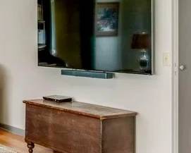 Antique blanket chest, 65" Samsung TV with wall mount, DVD player