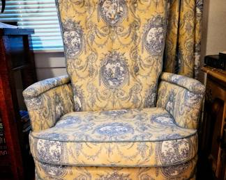 Cushioned arm chair