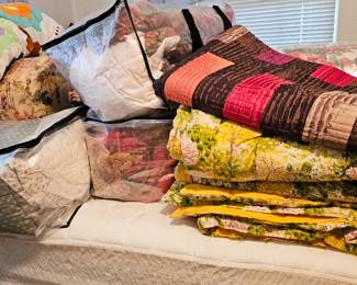 Many linens and bedding