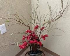 Vase with branches & red berries $35