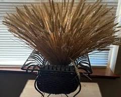 Metal basket with dried wheat $25