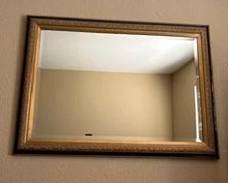 Large Gold and black framed mirror $75