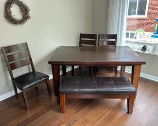 Table, three chairs and bench