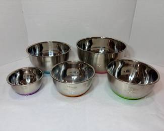 Wildone Stainless Nesting Mixing Bowls – Set of Five Five Wildone stainless mixing bowls in graduated sizes with colored non-slip bases. Nesting mixing bowls for baking, prep and serving. They look clean and bright in the photo.