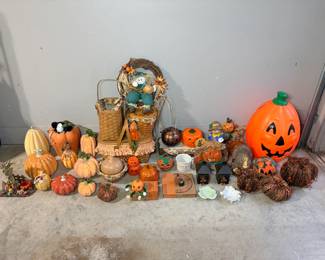Fall Harvest and Halloween Decor Lot – Pumpkins, Baskets and Jack-o'-Lantern A large fall decor lot with assorted decorative pumpkins and jack-o'-lanterns, a scarecrow wreath, woven baskets, lanterns, a turkey figure and a large plastic jack-o'-lantern. An easy autumn and Halloween decorating lot.