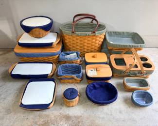 Longaberger Basket Collection with Blue Liners and Inserts A lot of Longaberger baskets with blue and green fabric liners, including lidded baskets, a large tote basket with leather-look handles, casserole baskets with white inserts, a basket with cup holders and smaller accent baskets. Great Longaberger pieces for serving, picnics and home storage.