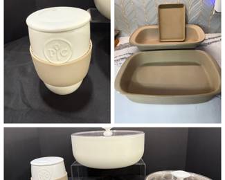 PC-Stamped Bakers and Covered Bowls A lot of bakers and covered pieces, including a rectangular baker, a loaf pan, a small bar pan, a lidded crock stamped with a PC logo and lidded white serving bowls. Practical bakeware for the home baker. Signs of use are typical for bakers like these.
