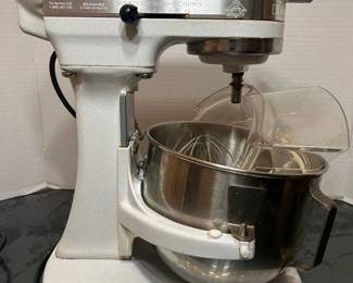 KitchenAid Bowl-Lift Stand Mixer with Stainless Bowl A KitchenAid bowl-lift stand mixer in a speckled white finish with a stainless mixing bowl, wire whip and clear pouring shield. A countertop stand mixer for baking and big batches. Working condition not confirmed — sold as found.