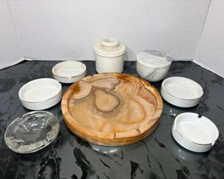 Onyx-Look and Marble-Look Ashtrays with White Ashtray Set A smoking accessory lot with a large carved onyx-look ashtray, a white and a gray marble-look covered jar, a heavy clear glass ashtray and four white ashtrays with gold trim. A nice lot for cigar enthusiasts or retro decor.
