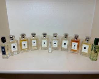 Jo Malone London Cologne Bottle Collection A row of Jo Malone London cologne bottles in clear glass with silver caps, along with a small travel spray and two other fragrance bottles. A large perfume lot for fragrance lovers or resellers. Fill levels vary — check each bottle in person.