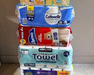 Household Paper Products Lot – Cottonelle, Charmin, Kirkland and Kleenex A stack of household paper goods in their packaging, including Cottonelle Mega rolls, Charmin Ultra Strong, Kirkland Signature paper towels, Member's Mark bath tissue and Kleenex tissue boxes. A practical bulk supply lot.
