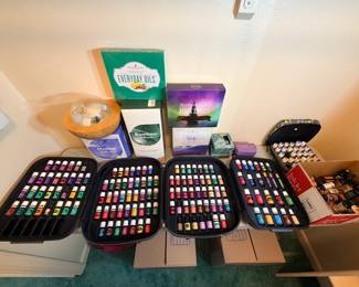 Young Living Essential Oils Collection with Diffusers and Cases A large Young Living essential oil lot in multiple zippered storage cases, along with a Young Living Everyday Oils box, a Northern Lights Black Spruce box, Home and Bamboo diffuser boxes, a wood-tone diffuser and a box of extra bottles. A great lot for aromatherapy enthusiasts. Fill levels vary.