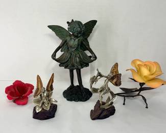 Fairy Decor – Verdigris Fairy Statue, Metal Fairies and Ceramic Roses A fairy decor lot with a verdigris-finish fairy girl statue, two silver-tone fairy figurines with butterfly wings on rock-look bases, and two ceramic roses, one on a metal branch. A charming lot for whimsical decor and fairy collectors.
