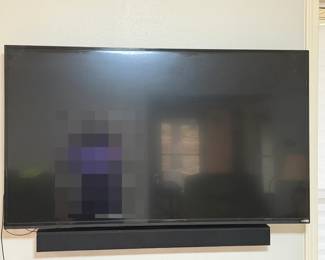 Vizio Flat Screen TV with Soundbar A wall-mounted Vizio flat screen television with a soundbar mounted below. A practical setup for a living room, bedroom or game room. Working condition not confirmed — sold as found.