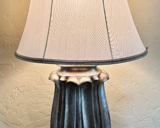 Three beautiful lamps with a silver gold base accent