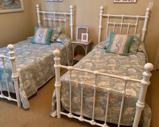 A Set of White Iron Twin Beds with Mattresses