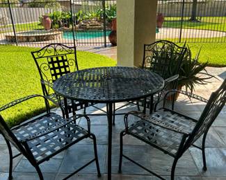 Metal table with four chairs