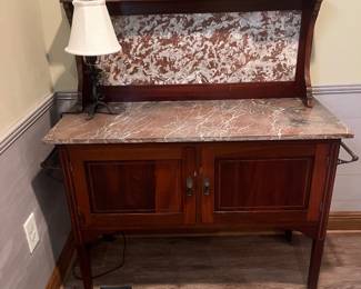 Marble top washstand with marble backsplash 