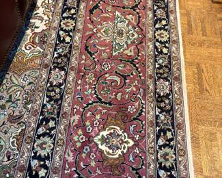 DETAIL OF AREA RUG