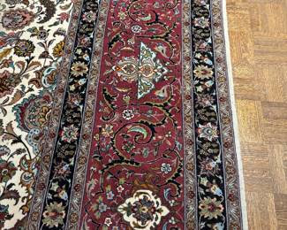 DETAIL OF AREA RUG