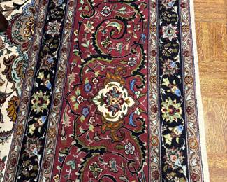 DETAIL OF AREA RUG