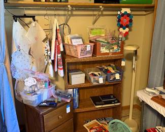 crafts and office items, bookshelf, small side drawers