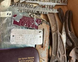 Antique automobile / car dealership tags. Studebaker. Hudson. Wrenches.