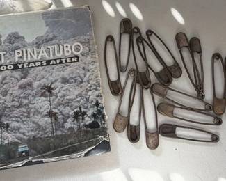 Volcano book. Large safety pins. 