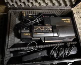 Cam-Corders. In hard cases. 